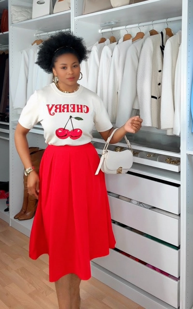 JUPE MI-LONGUE À PLIS PLAT